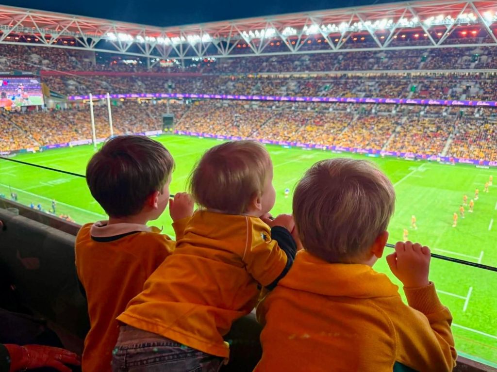 Some young Wallaby supporters in the sold-out crowd at Suncorp Stadium.